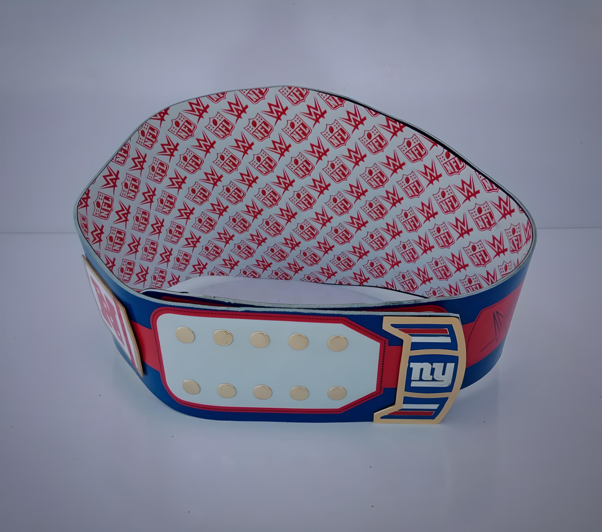 Official New York Giants championship belt merging WWE and NFL heritage.