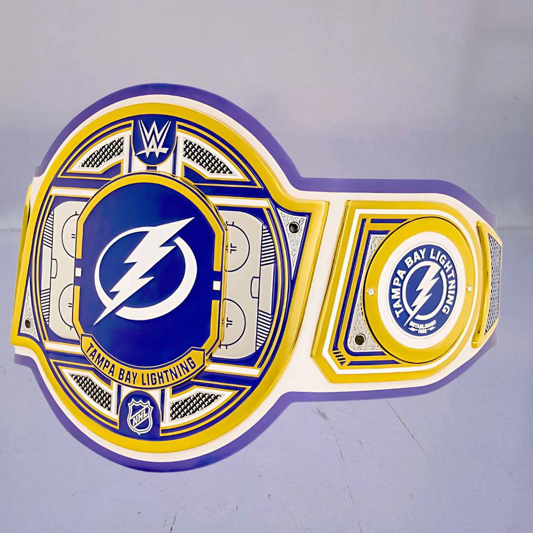 Close-up of the Tampa Bay Lightning WWE Championship Belt, showcasing blue and white accents.