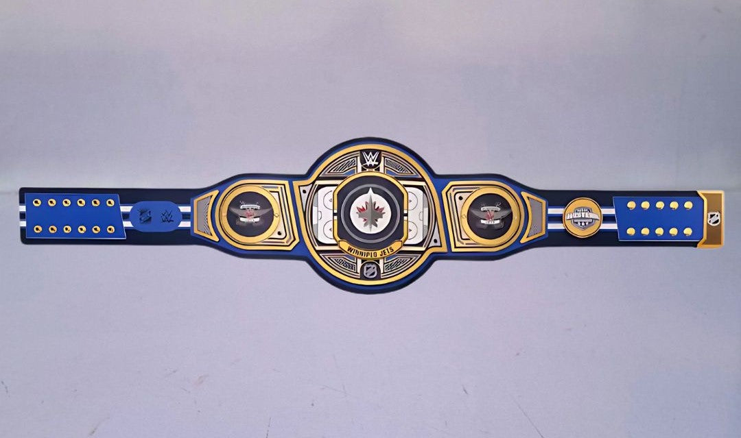 Detailed view of the Winnipeg Jets WWE Championship Belt, featuring embossed logos and a polished finish.