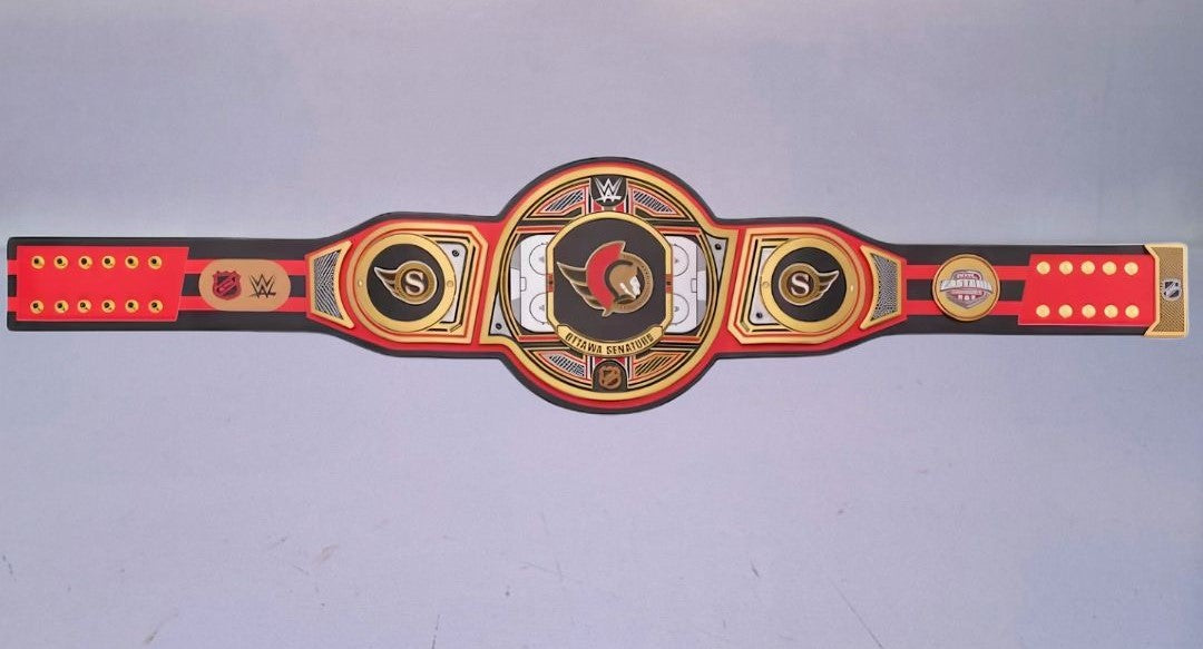 Detailed view of the Ottawa Senators WWE Championship Belt, featuring embossed logos and a polished finish.